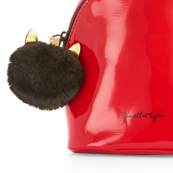 Kendall + Kylie Glossy Pom-Pom Mini Backpack Bag - Picture 5 of 8
